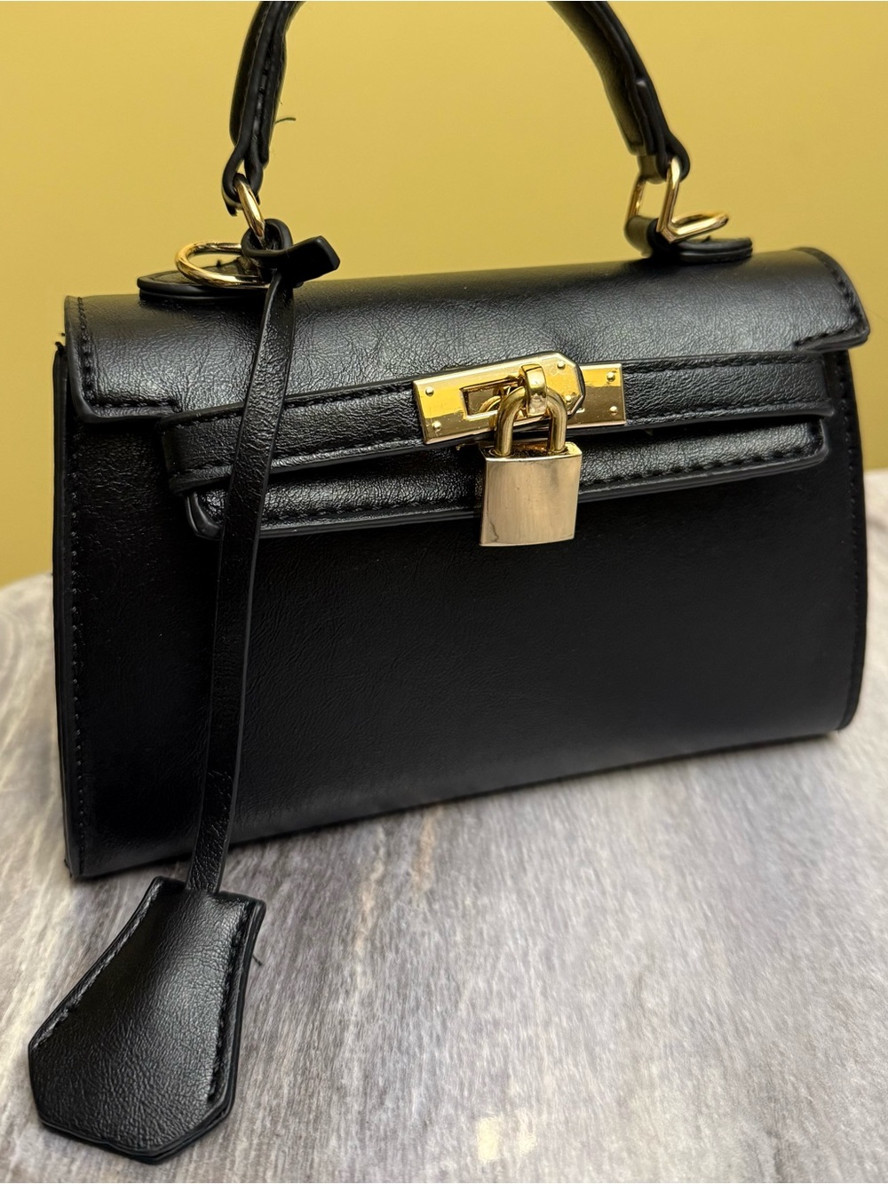 Elegant Black Top-Handle Women’s Bag with Gold Hardware